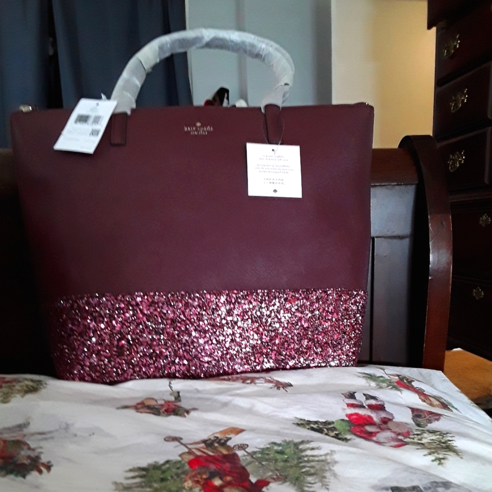 Kate Spade glitter and leather bag new with tags..Penny